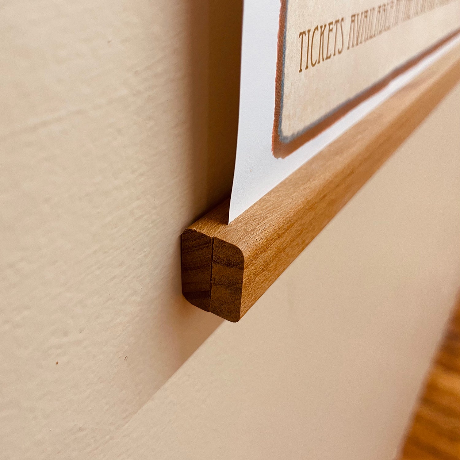 a close up of a wooden frame on a wall